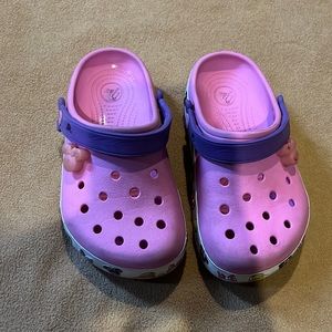 Pink and purple crocs clogs with Minnie mouse engravings